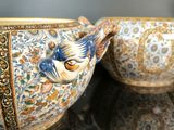 a bowl and a cup sitting on a table