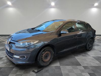 a picture of a gray car in a garage