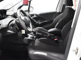 a picture of the inside of a car with the driver ' s seat up