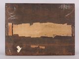 an old piece of wood with a piece of brown paper on it