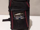 a small black bag with a credit card in it