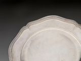 a white plate that is sitting on a table