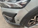 a close up of the front bumper of a car