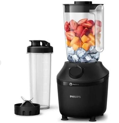un mixeur qui contient beaucoup de fruits