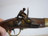 a close up of a person holding a gun