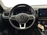 the interior of a car with a steering wheel and dashboard controls