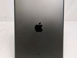a close up of the back of an ipad on a white surface