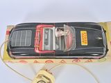 a toy car that is sitting on top of a box