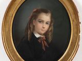 portrait of a young girl in a black dress with a red bow
