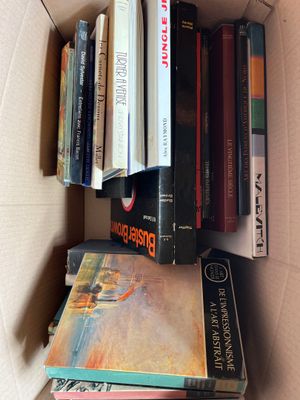 a box full of books that are sitting on a table