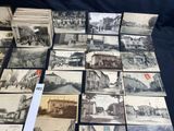 several old black and white photographs of a street and buildings