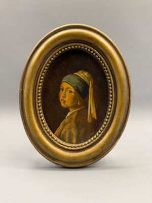Portrait d'une jeune fille à la boucle d'oreille de perle
