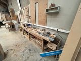 a picture of a workbench in a building with tools on it
