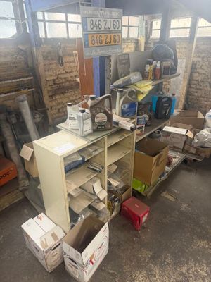 a room with a lot of boxes and boxes on the floor