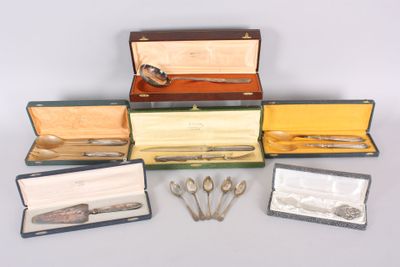 five different types of silverware in a case