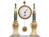 a clock that is sitting on top of a marble stand