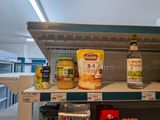 many different types of food on the shelves in the store