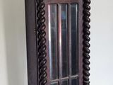 a grandfather clock sitting on the floor in a room