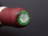 a close up of a bottle of wine on a table