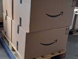 a pallet with boxes on it in a warehouse