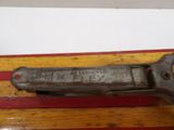 a wrenet that is sitting on top of a piece of wood