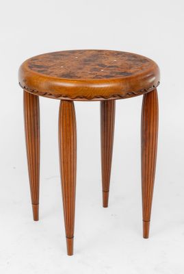 an image of a small wooden stool with legs and a wooden top
