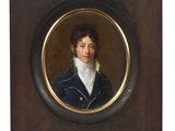 portrait of a gentleman in a blue jacket and white collared shirt