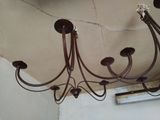 a chandelier hanging from the ceiling in a room
