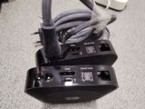 a close up of a power strip with a cord attached to it