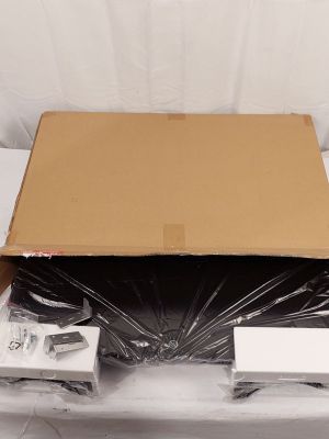 a cardboard box sitting on top of a white table
