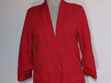 une image d'une veste rouge sur un mannequin, un mannequin, un mannequin, un mannequin, un mannequin, un mannequin, un mannequin, un mannequin