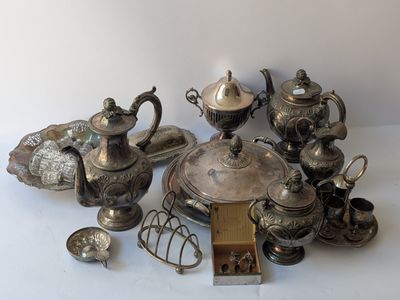 a lot of silver items that are on a table
