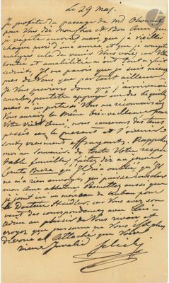 une lettre écrite à l'encre noire sur une feuille de papier