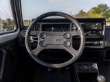 a steering wheel and dashboard of a car in a car showroom