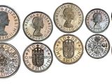 an image of a row of coins with different faces on them