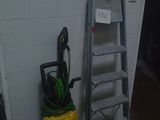 a ladder that is next to a stack of toilet paper