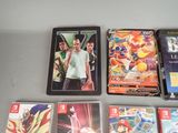 a lot of video game cards on the table