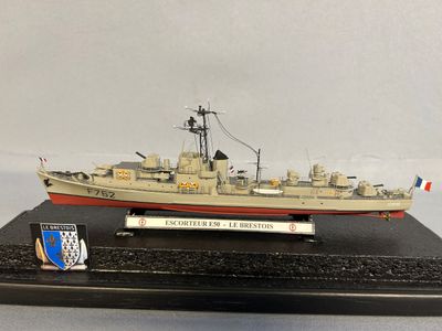 an image of a model of a battleship on a stand