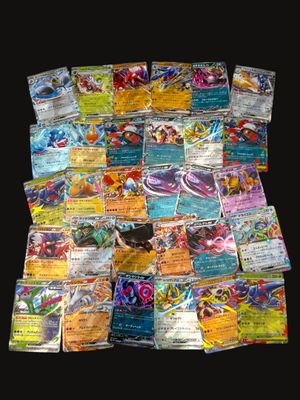 many different types of pokemon cards on the table