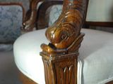 a chair with an elephant head on it in a living room