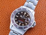 an image of a rolex watch sitting on top of a brown leather surface