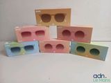 four pairs of sunglasses in different colors and sizes