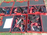 many tools in the red cases on the ground