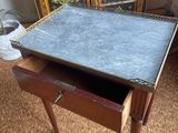 a small table with a marble top on it