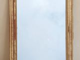 a mirror that is sitting on a table