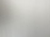 a whiteboard with a drawing of a house on it