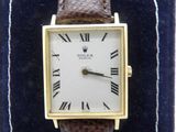 an image of a wrist watch with roman numerals on it