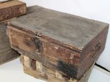 two old wooden boxes stacked on top of each other