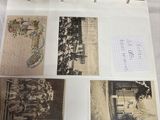 une valise noire contenant des photos de personnes