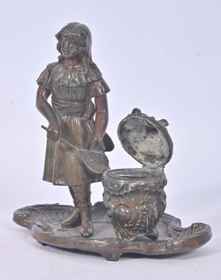 bronze figurine of a girl with a pot and a dog